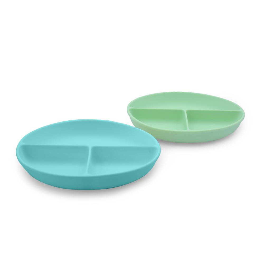 Two divided plates, one turquoise and one green, on a white background