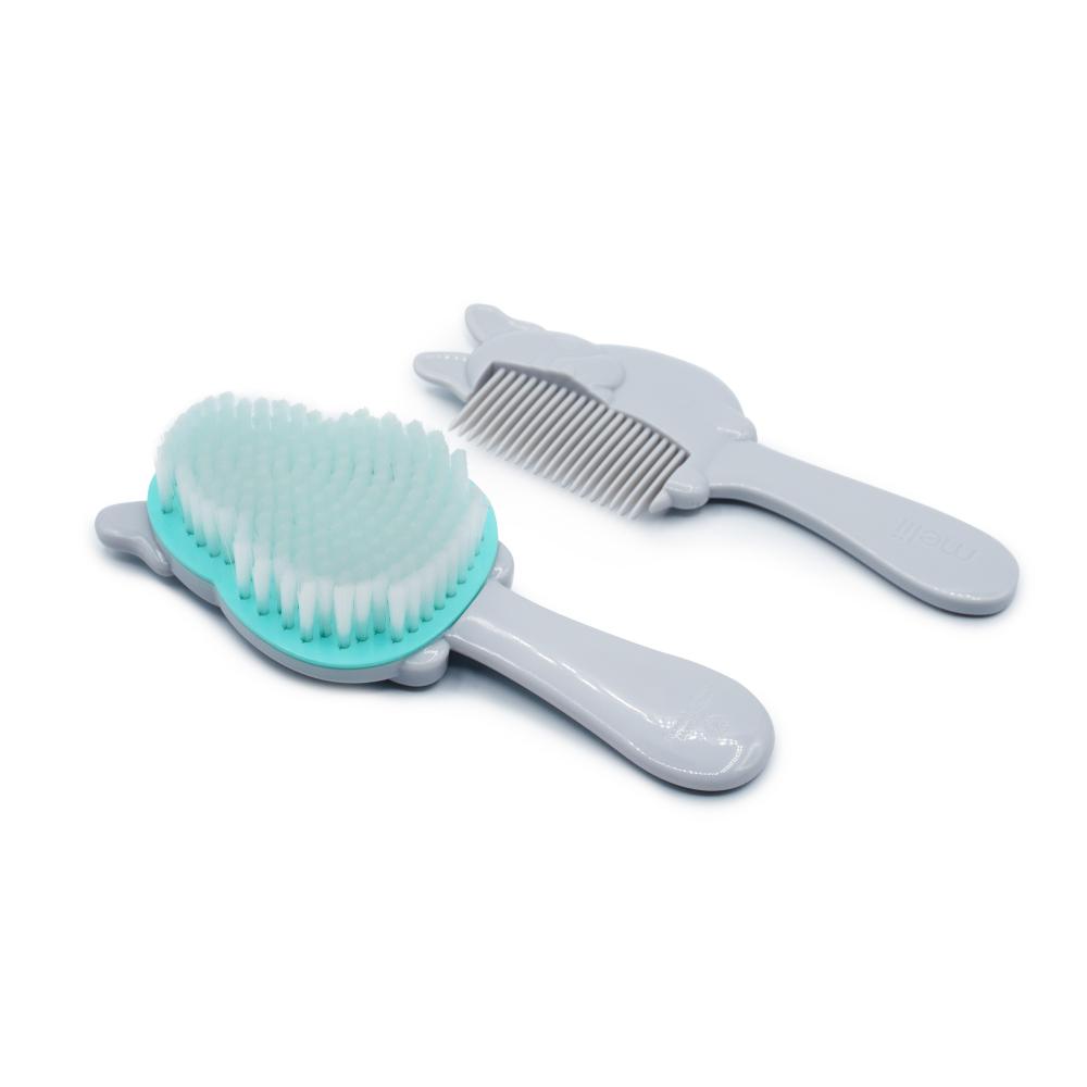 Two baby grooming tools, a brush with a turquoise head and gray handle, and a comb with a gray handle, on a white background.