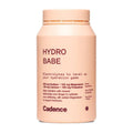A peach-colored bottle of Cadence Hydro Babe electrolyte powder supplement on a solid white background.