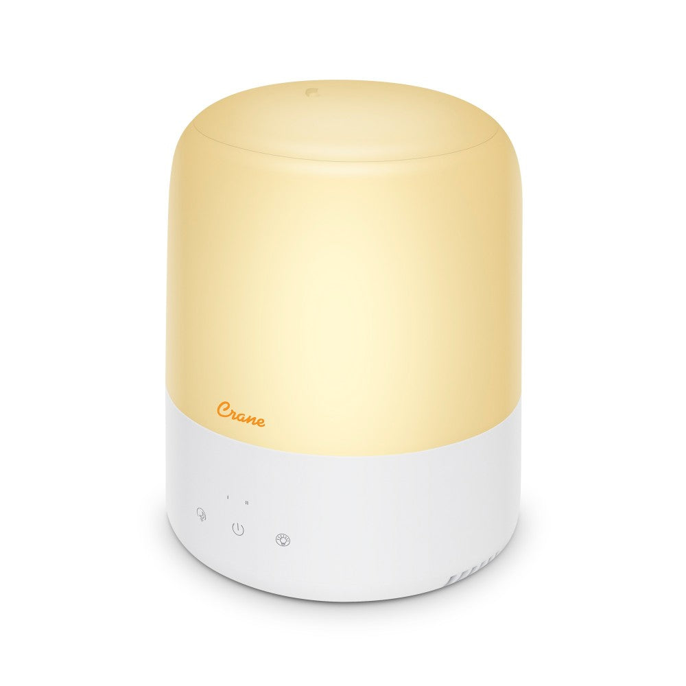 White humidifier with light operating, with 'Crane' branding on a white background