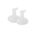 Two clear silicone pump diaphragms for a breastpump on a white background