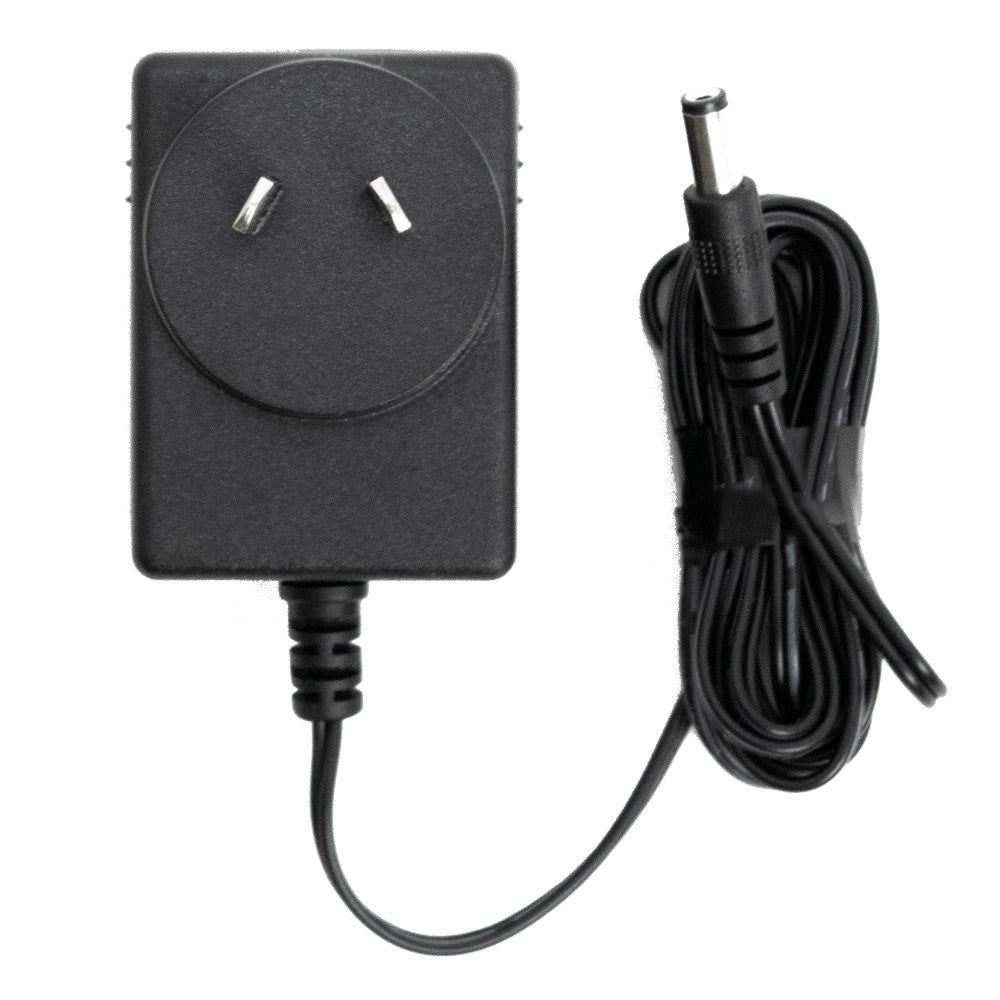 Black AC adapter power supply with a two-prong NZ/AU plug and a coiled black cable with a barrel connector, shown on a white background.