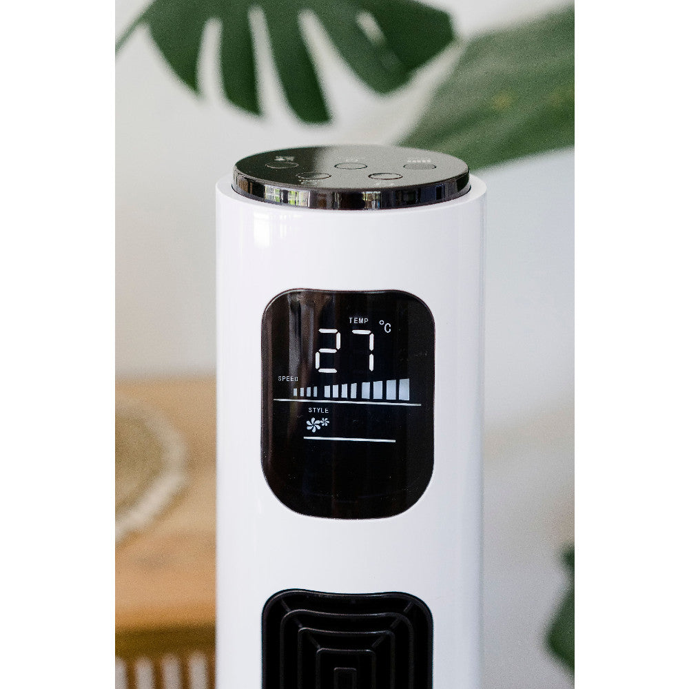 White Tower Fan with digital display on a blurred background