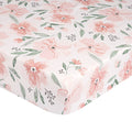 Floral pink and green sheet on a white background