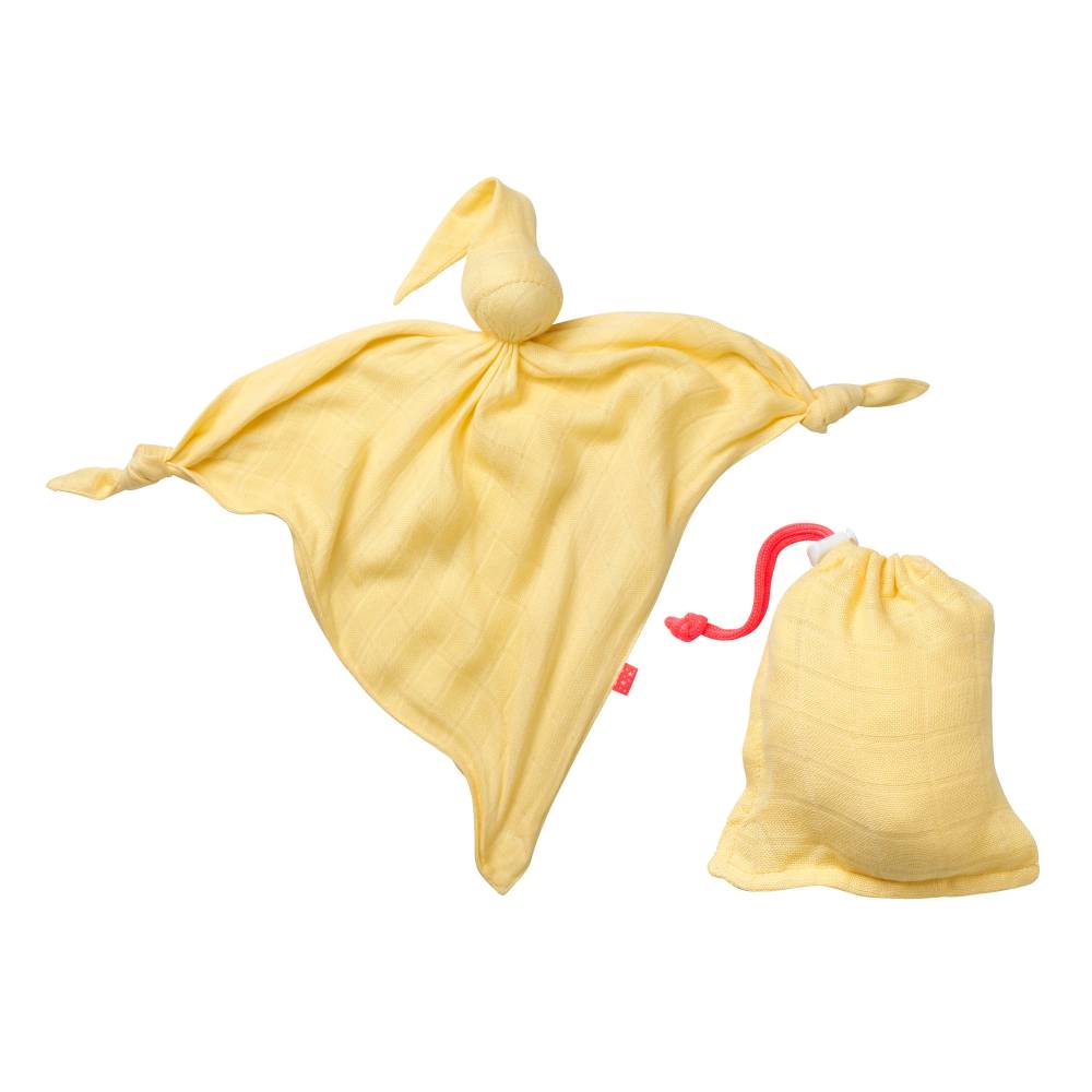 A pale yellow muslin Mussi Cuski baby security blanket  shown next to its matching drawstring storage pouch with a red carrying loop, on a solid white background.
