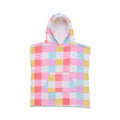 A children's hooded towel with a pastel pink, yellow, and light blue gingham check pattern on a white background, featuring a front pocket and a small 'CRYWOLF' logo printed on the chest.