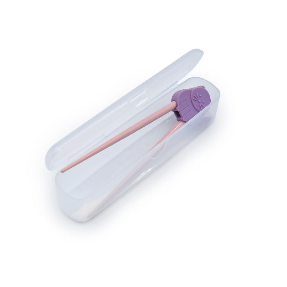 children's Purple and pink trainer chopsticks with pink accents in a clear plastic case on a white background