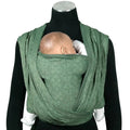Didymos Baby Wrap Sling Linen - Whispering Woods shown on a mannequin against a white background. 