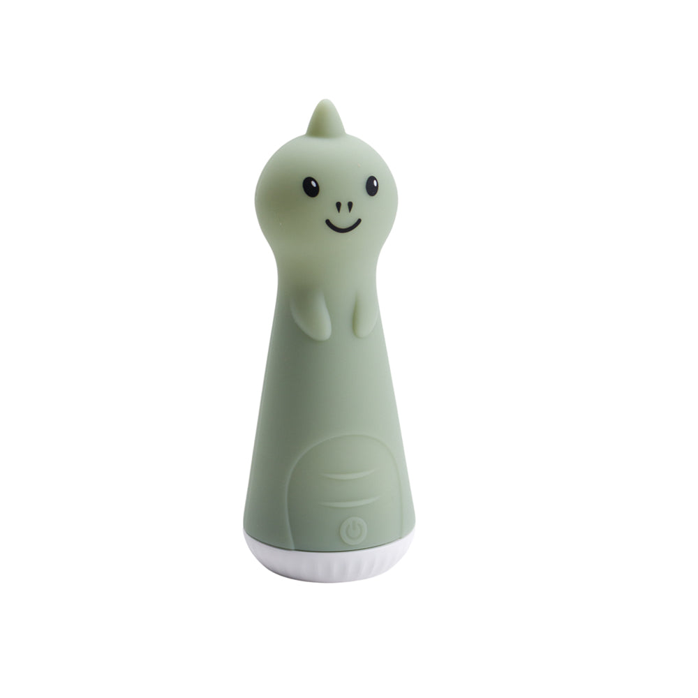 Green silicone dinosaur torch nightlight toy with a smiling face on a white background