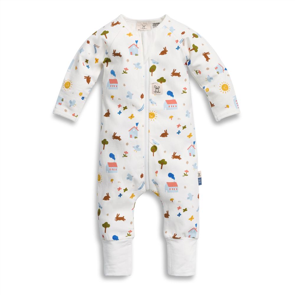 Baby onesie with colorful animal and nature pattern on a white background