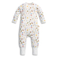Baby onesie with colorful animal pattern on a white background