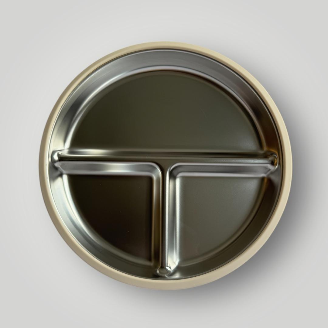 A round stainless steel divided plate with three compartments, shown from a top-down perspective on a light gray background.