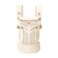 Beige baby carrier with mesh design on a white background