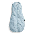 Light blue baby sleeping bag with subtle pattern on a white background