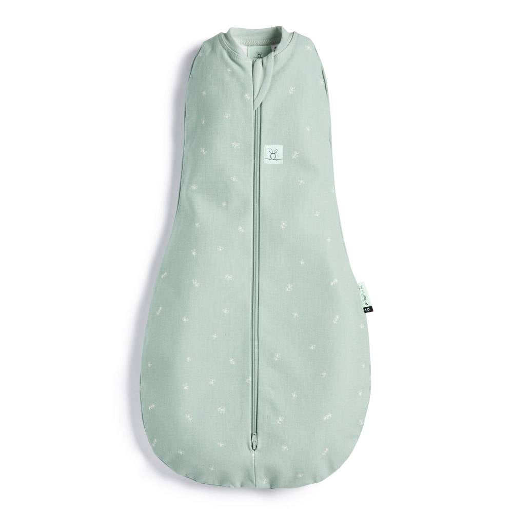 Light green prem sized baby swaddle bag with star pattern on a white background