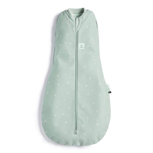 Light green prem sized baby swaddle bag with star pattern on a white background