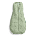 Green baby zip swaddle with leaf pattern on a white background