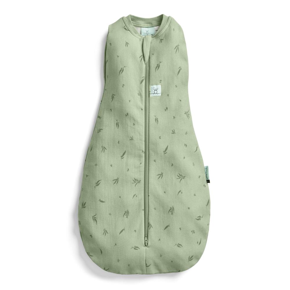 Green baby swaddle sleeping bag with leaf pattern on a white background