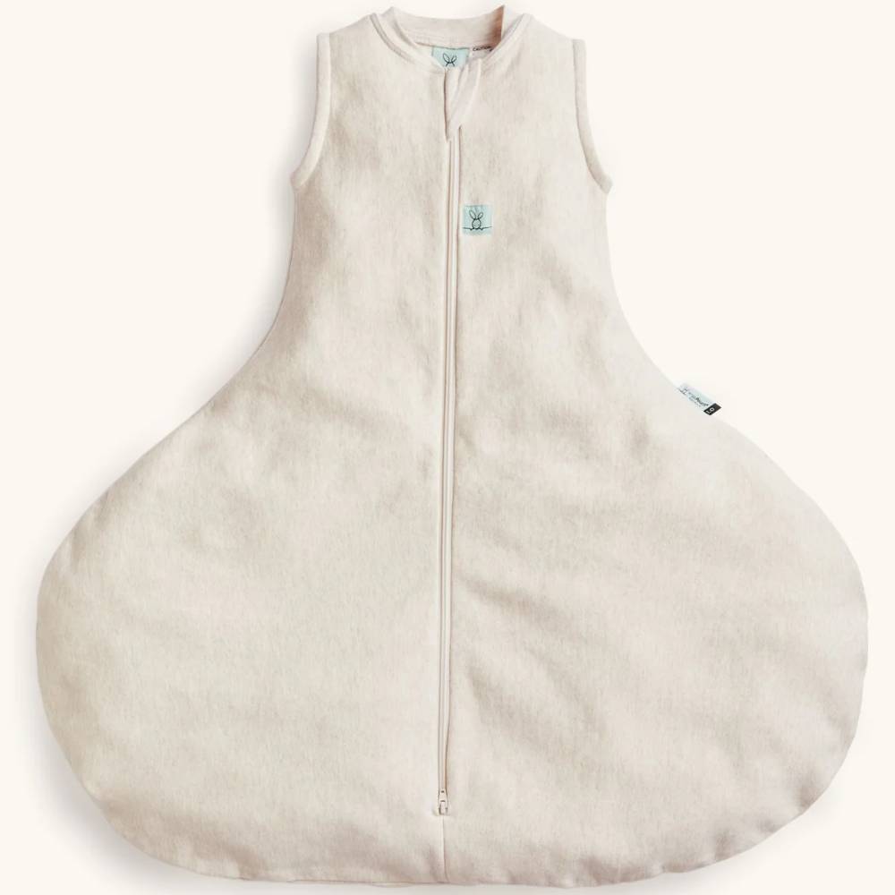 Beige baby sleeping bag with a zipper on a white background