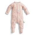 Pink baby onesie with floral patterns on a white background