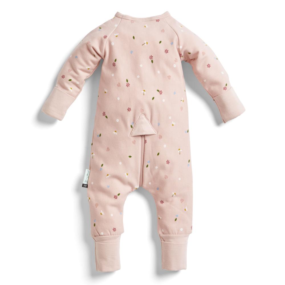 Pink baby onesie with floral pattern on a white background