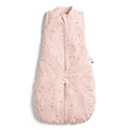 Pink baby sleeping bag with colorful patterns on a white background