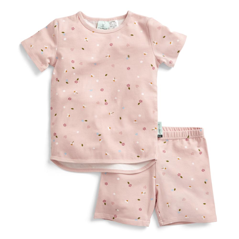 Pink children's summer pajama set with floral pattern on a white background