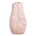 Pink baby sleeping bag with floral pattern on a white background