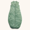 Green baby sleeping bag with floral pattern on a white background