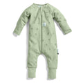 Green baby onesie with a subtle pattern on a white background
