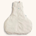 Beige hip dysplasia baby sleeping bag with a zipper on a white background