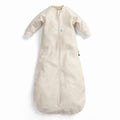 Beige baby sleeping bag with sleeves on a white background