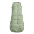 Green baby sleeping bag with subtle pattern on a white background