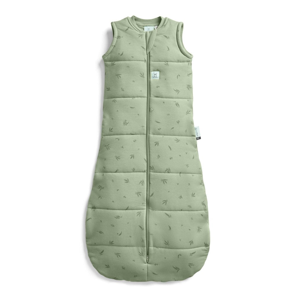 Green baby sleeping bag with subtle pattern on a white background