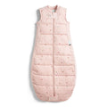 Pink quilted baby sleeping bag with a subtle pattern on a white background