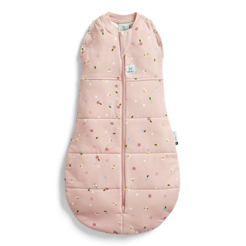 Pink baby swaddle sleeping bag with floral pattern on a white background