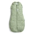 Green baby swaddle sleeping bag with leaf pattern on a white background