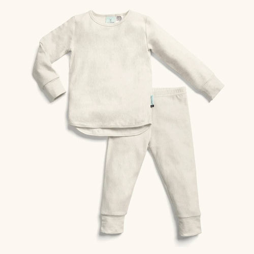 Children's beige pajama set on a white background