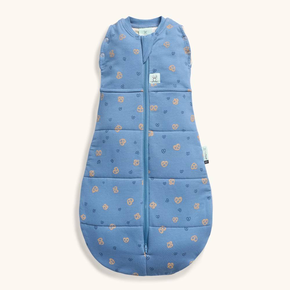 Blue baby sleeping bag with pretzel pattern on a white background
