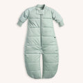 Green baby sleeping bag on a white background