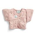 pink swaddle/cardigan with flowers on a white background