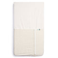 HugMe Blanket in Caramel grid pattern on a mattress on white background