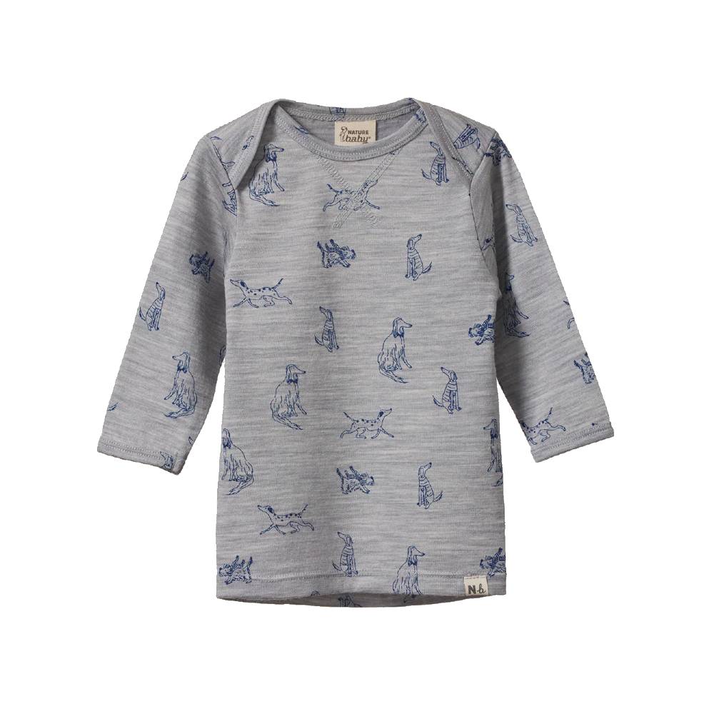 Grey merino long-sleeve shirt with blue dog pattern and envelope neckline on a white background