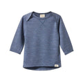 Blue indigo merino long-sleeve shirt with envelope neck on a white background