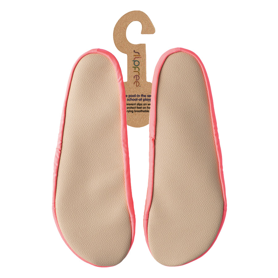 Beige shoe insoles with pink edges on a white background