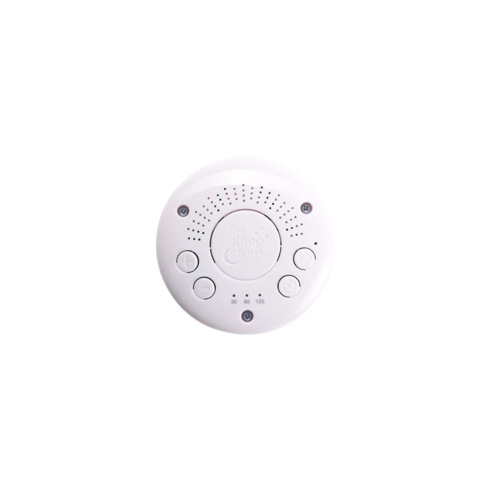 White sound machine insert with buttons on a white background