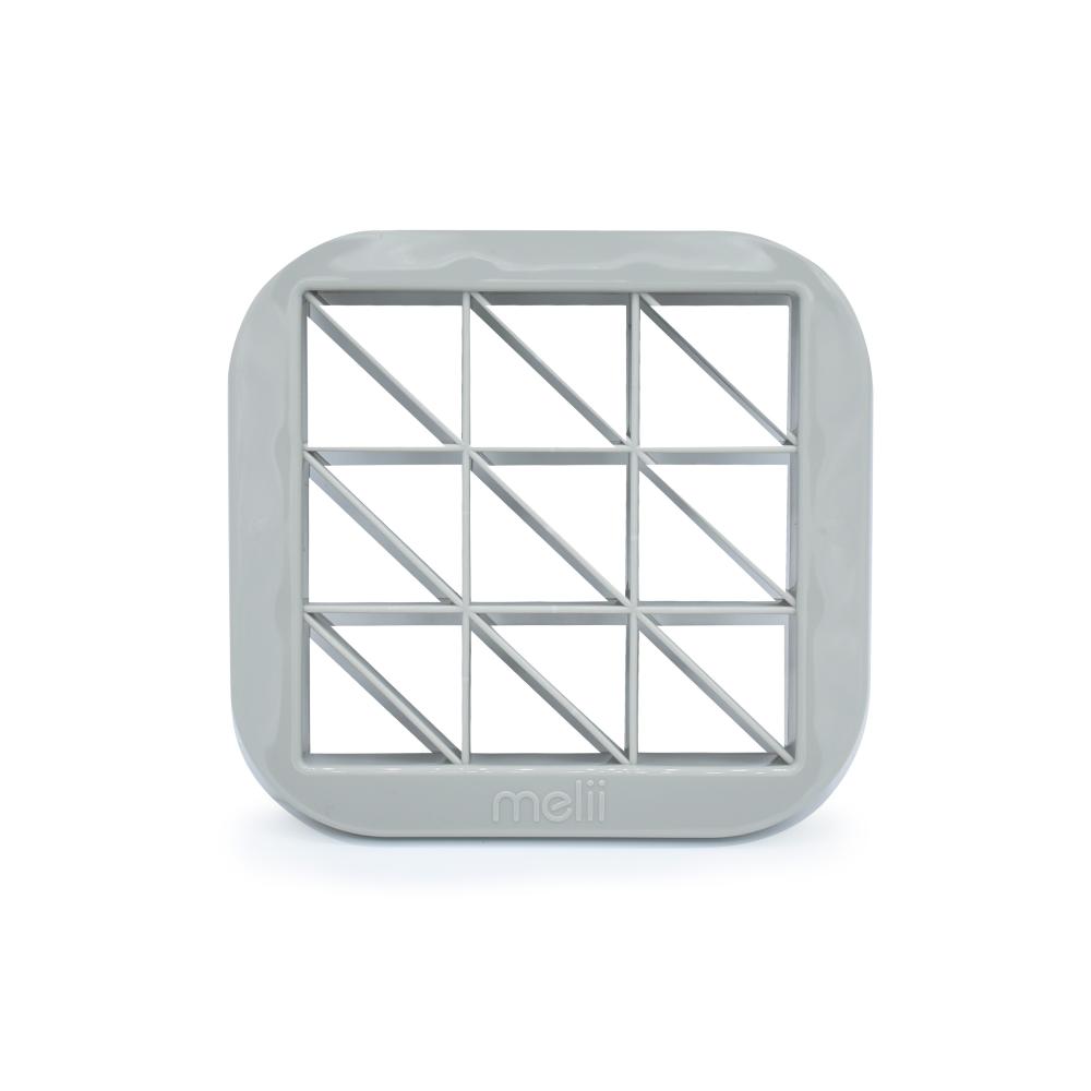 Gray cutter with grid pattern on a white background