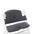 Grey highchair insert shown on white highchair on a white background