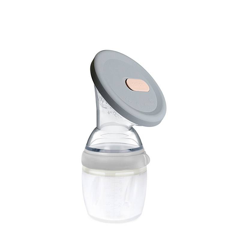 haakaa silicone manual breastpump with grey cap against a white background 