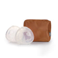 2 pack of ladybug milk collectors with brown leather look pouch against a white bakground 
